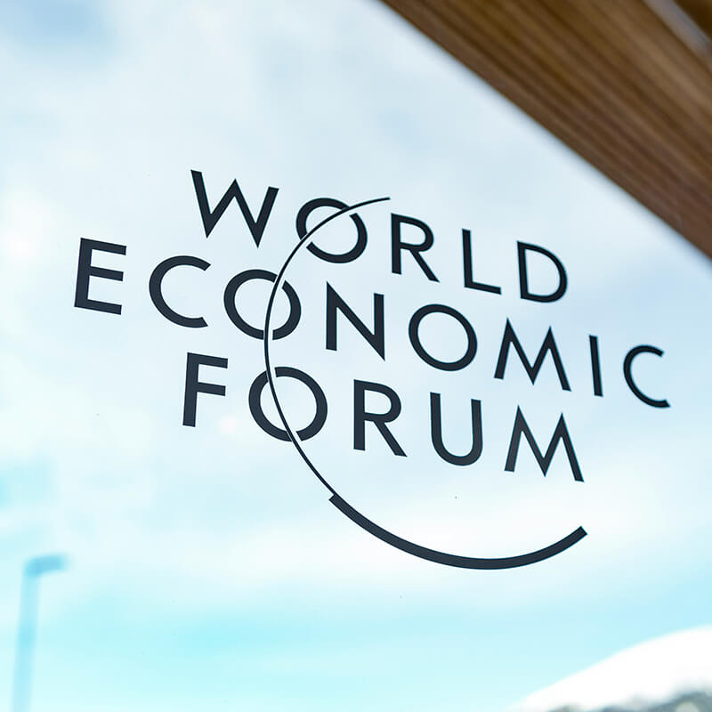 World Economic Forum logo on a blue background.