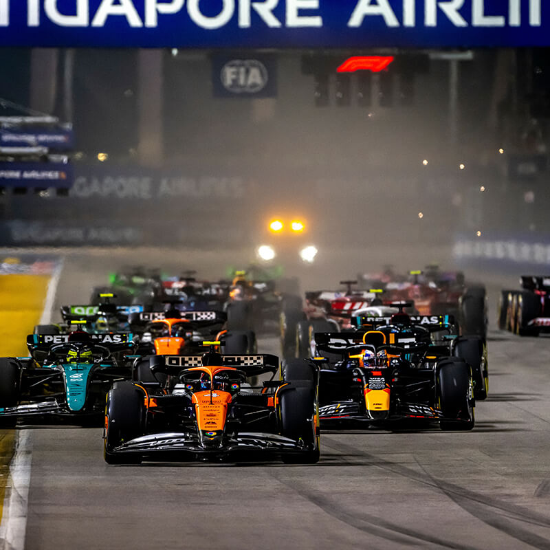 Formula 1 race with cars on the track.